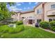 Beautiful condo featuring well-maintained lawns, stone accents, and a delightful outdoor space at 10725 Eliot Cir # 102, Denver, CO 80234