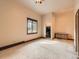 Empty bedroom featuring neutral walls, carpeted flooring, and a walk-in closet at 15955 W 52Nd Dr, Golden, CO 80403