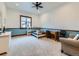 Bright bedroom with carpeted flooring, and a desk area at 15955 W 52Nd Dr, Golden, CO 80403
