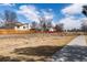 View of the property backing to a greenbelt and stream for added privacy at 8757 Estes Ct, Arvada, CO 80005