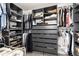 Large walk-in closet with ample shelving and hanging space at 6612 Merrimack Dr, Castle Pines, CO 80108