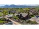 Aerial shot of home and surrounding neighborhood with mature trees and mountain views at 2630 Juniper Ave # 37-5, Boulder, CO 80304