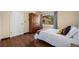 Comfortable bedroom with wood floors, closet, and large window at 2630 Juniper Ave # 37-5, Boulder, CO 80304