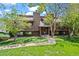 Inviting townhome with well-manicured lawn, mature trees, and private entrance at 2630 Juniper Ave # 37-5, Boulder, CO 80304