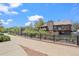 Charming exterior view of building showing balconies and mature trees at 2630 Juniper Ave # 37-5, Boulder, CO 80304