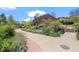 Exterior view showing lush landscaping, walking paths, and the building at 2630 Juniper Ave # 37-5, Boulder, CO 80304