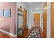 Entryway featuring wood floors, hall tree, and neutral decor at 534 E 7Th Ave # 205, Denver, CO 80203