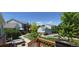 Exterior shot showcasing units with decks, green lawn, and the community's setting at 4220 E 119Th Pl # A, Thornton, CO 80233