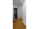 Hallway with laundry closet and storage space at 4220 E 119Th Pl # A, Thornton, CO 80233