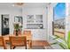 Charming dining area with built-in cabinets and a view of the outdoors at 3059 N Humboldt St, Denver, CO 80205