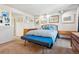 Hallway view leads to bedroom featuring carpet, glass art, and vanity with sink at 3832 S Quebec St, Denver, CO 80237
