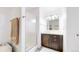 Bathroom featuring a vanity, shower, and classic fixtures at 66095 E Kettle Pl, Byers, CO 80103