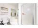 Bathroom featuring a corner tub, toilet, and shower stall at 66095 E Kettle Pl, Byers, CO 80103