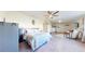 Large bedroom featuring tile floors, a ceiling fan, and space to relax at 66095 E Kettle Pl, Byers, CO 80103