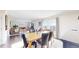 Cozy dining space merging seamlessly into living room with great natural lighting at 66095 E Kettle Pl, Byers, CO 80103
