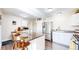 Well-equipped kitchen featuring stainless steel appliances and a breakfast bar at 66095 E Kettle Pl, Byers, CO 80103