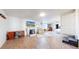 Spacious living room features a fireplace and tile floor at 66095 E Kettle Pl, Byers, CO 80103