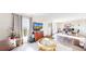 Inviting living room featuring a cozy seating area and natural light at 66095 E Kettle Pl, Byers, CO 80103