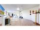 Spacious open floor plan features tile floor and adjoins a bedroom at 66095 E Kettle Pl, Byers, CO 80103