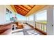 Relaxing porch featuring a cozy chair and views of the expansive surroundings at 66095 E Kettle Pl, Byers, CO 80103