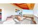 Inviting porch with comfortable chairs and scenic views, perfect for relaxation at 66095 E Kettle Pl, Byers, CO 80103