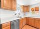Kitchen features stainless steel appliances, hardwood floors and a window above the sink at 4163 S Decatur St, Englewood, CO 80110