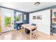 Home office offers natural light with backyard views and modern white cabinets at 4163 S Decatur St, Englewood, CO 80110