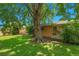 Large backyard with mature shade tree at 2682 S Benton St, Lakewood, CO 80227