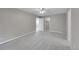 Carpeted bedroom with closet and neutral paint color at 2682 S Benton St, Lakewood, CO 80227