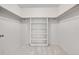 Walk in closet with carpet and shelving at 2682 S Benton St, Lakewood, CO 80227