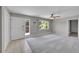 Bright living room with neutral paint, large windows, and plush carpeting at 2682 S Benton St, Lakewood, CO 80227