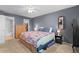 Spacious main bedroom featuring a walk-in closet and ensuite bathroom at 3021 S Ursula Cir # 102, Aurora, CO 80014
