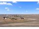 Large estate showcasing multiple buildings, pastures, and riding arena at 7600 Patrick Trl, Elizabeth, CO 80107
