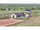 Well-maintained barn, horse stalls, and paddock area, creating an ideal equestrian facility at 7600 Patrick Trl, Elizabeth, CO 80107
