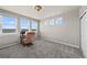 Bedroom with multiple windows overlooking a beautiful scenic view, desk and chair at 7600 Patrick Trl, Elizabeth, CO 80107