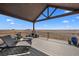 Outdoor deck with lounge chairs overlooking panoramic views at 7600 Patrick Trl, Elizabeth, CO 80107