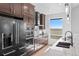 Well-appointed kitchen features stainless appliances, granite countertops, and a large window with views at 7600 Patrick Trl, Elizabeth, CO 80107