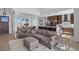 Open concept features a living room connected to a modern kitchen, perfect for entertaining and Gathering time at 7600 Patrick Trl, Elizabeth, CO 80107