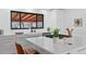 Modern kitchen featuring white countertops, a large window, and stainless steel appliances at 1325 S Grape St, Denver, CO 80222