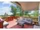 Inviting outdoor deck with comfortable seating, perfect for enjoying the scenic views and fresh air at 9576 E 147Th Pl, Brighton, CO 80602