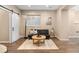 Cozy living area with modern decor and a comfortable seating arrangement at 9576 E 147Th Pl, Brighton, CO 80602