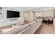 Spacious living room featuring built-in shelving and a cozy seating area at 9576 E 147Th Pl, Brighton, CO 80602