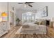 Bright main bedroom boasts vaulted ceilings, beautiful bay window, and en suite bathroom at 9576 E 147Th Pl, Brighton, CO 80602