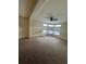 Bedroom with carpet and large windows at 10871 Kitty Dr, Conifer, CO 80433