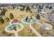 Community playground with walking paths, sport court, and covered picnic area at 16349 E Radcliff Pl # B, Aurora, CO 80015