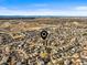 An aerial view of a neighborhood with mountains in the distance at 16118 Peregrine Dr, Parker, CO 80134