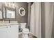 Bathroom featuring two different shaped mirrors above the sink at 16118 Peregrine Dr, Parker, CO 80134