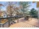 Spacious wood deck featuring outdoor seating area and fire pit at 16118 Peregrine Dr, Parker, CO 80134