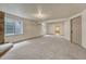 Large finished basement with natural light and access to other rooms at 11837 Meadowood Ln, Parker, CO 80138