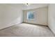 Bedroom with neutral carpet and good natural light from the basement window at 11837 Meadowood Ln, Parker, CO 80138